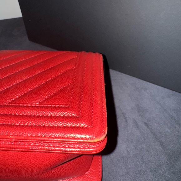 This is an authentic CHANEL Caviar Chevron Quilted Medium Boy Flap in Red - Picture 6 of 9